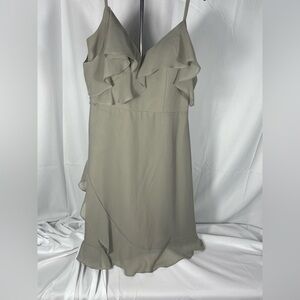 Formal mini dress w/ruffle accents and spaghetti straps. Color is gray / silver